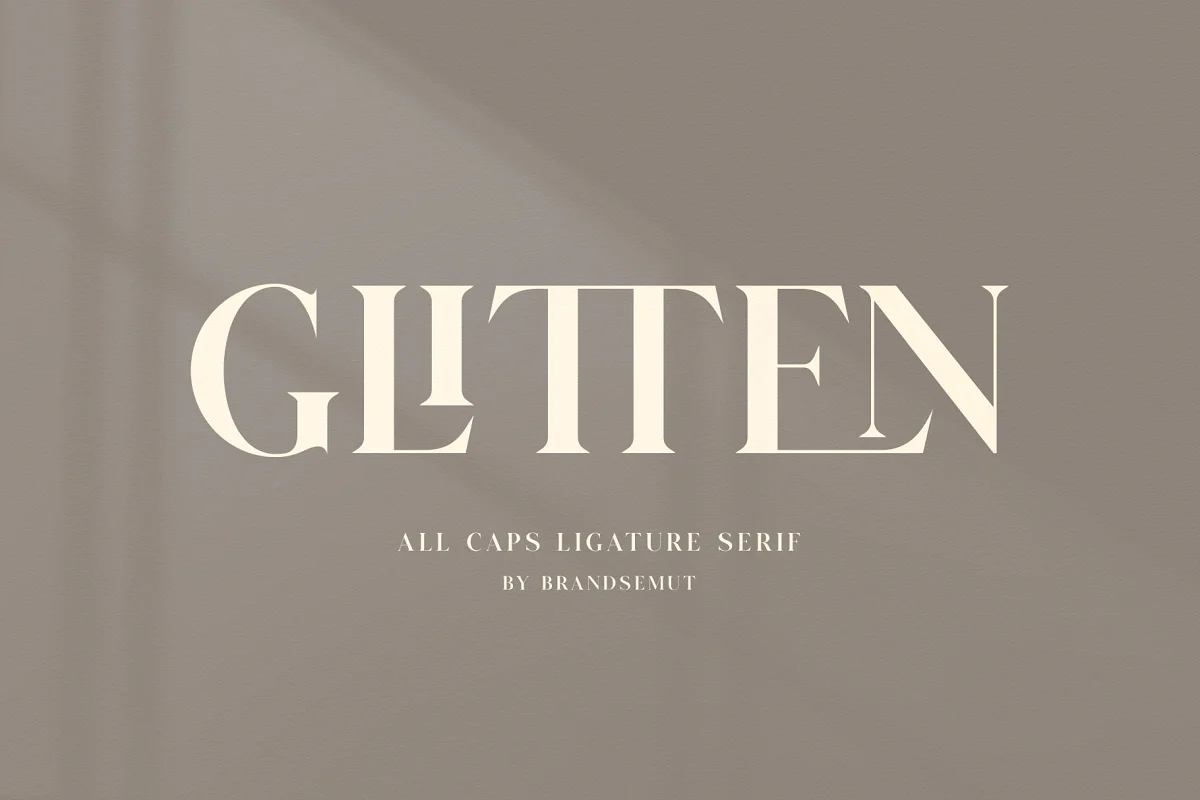 Glitten All Caps Ligature Serif Font